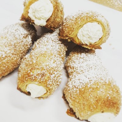 Our famous hand rolled puff pastry filled with whip cream.